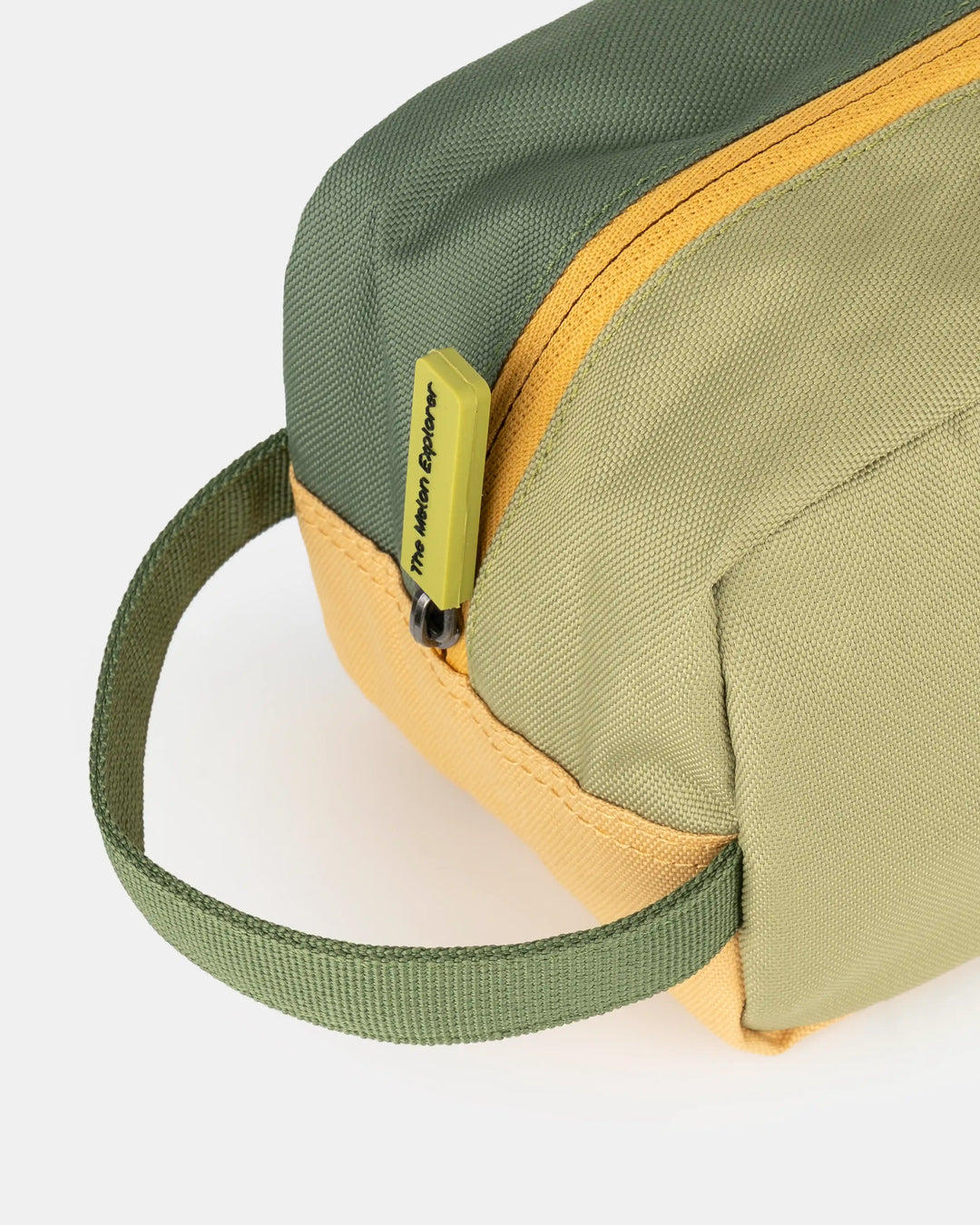 Handle detail of green and orange recycled polyester MAJU toiletry bag