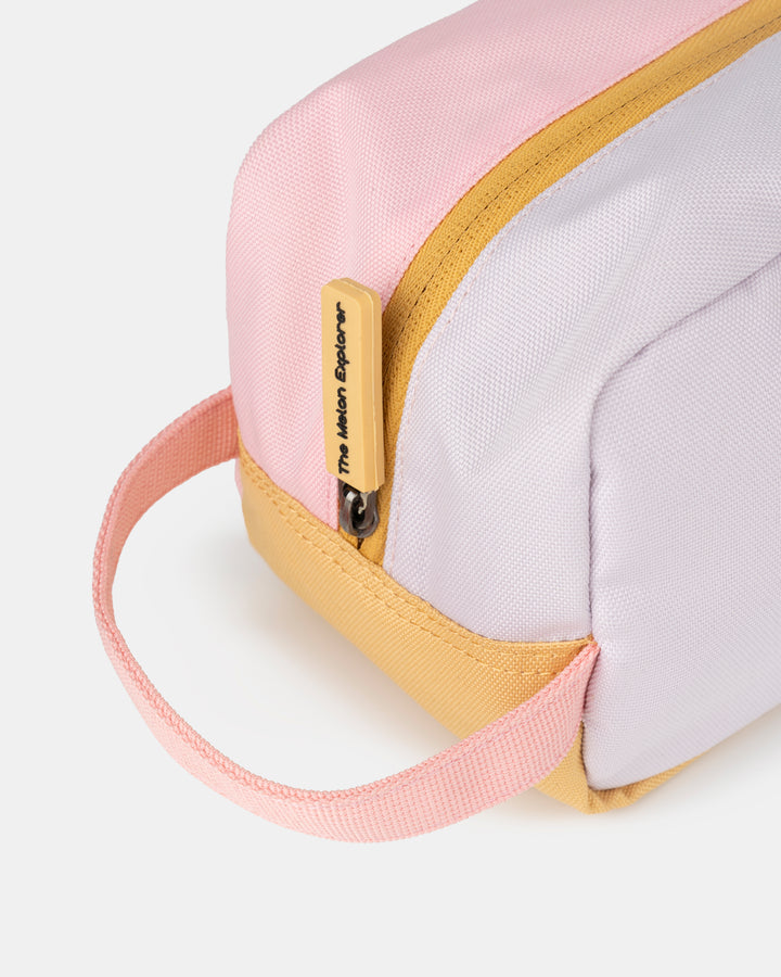 Detail of handle sustainable recycled polyester toiletry bag in pink purple and orange for daily use from the collection MAJU – The Melon Explorer