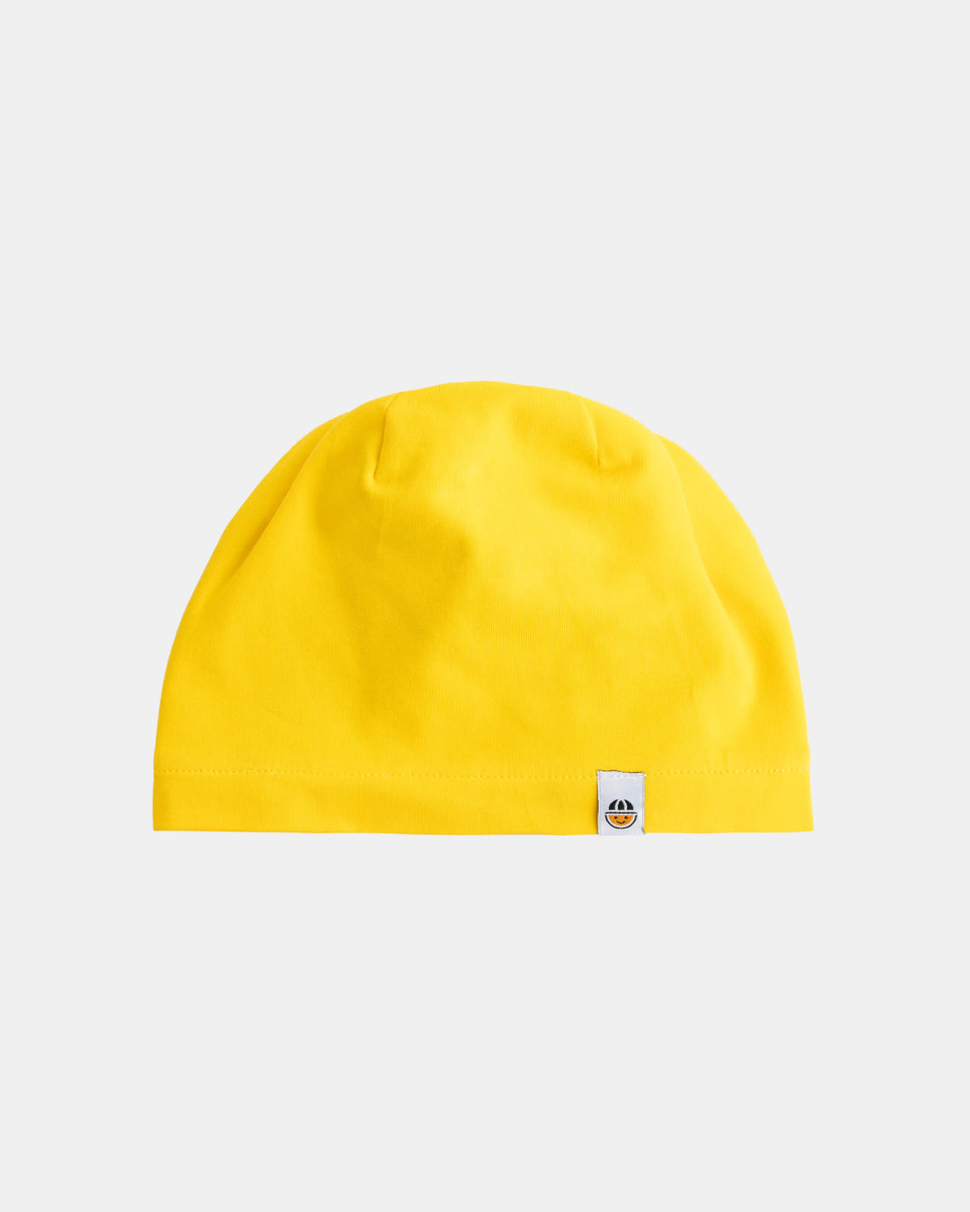 Reversible yellow organic cotton beanie from the Breeze collection, flat lay front view